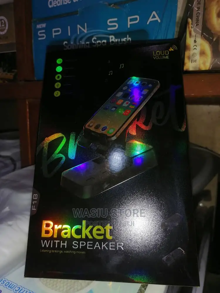 Mobile Phone Holder and Bluetooth Speaker With USB Ports