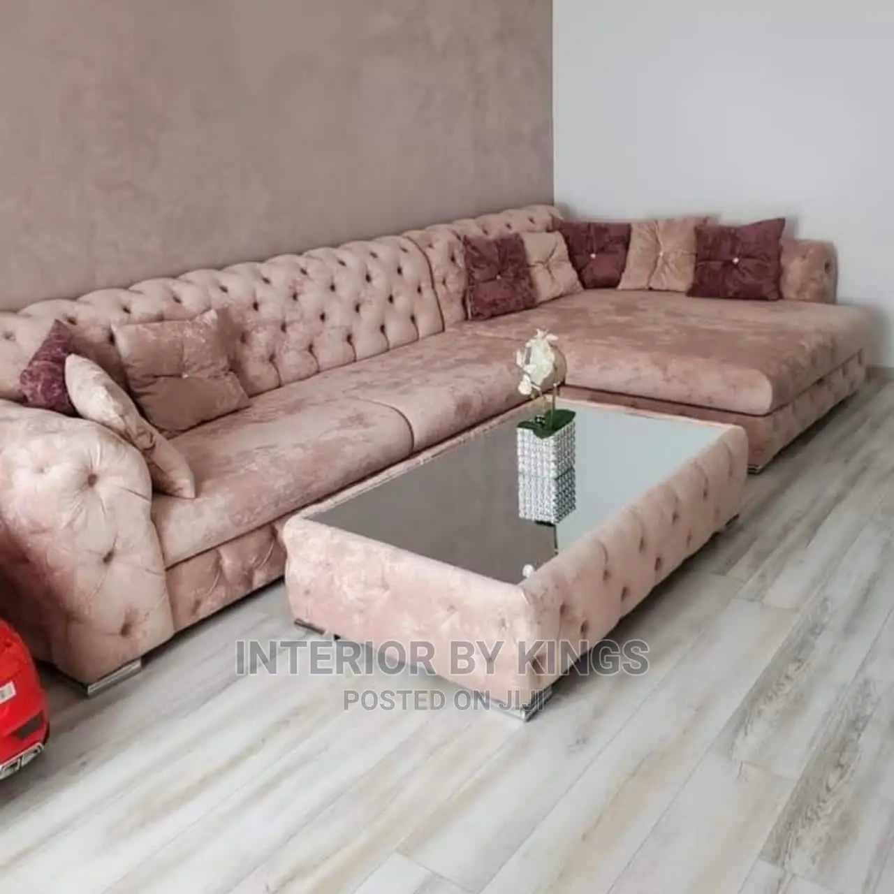 L-Shaped Fabric Sofa With a Center Ottoman Can Come in Color