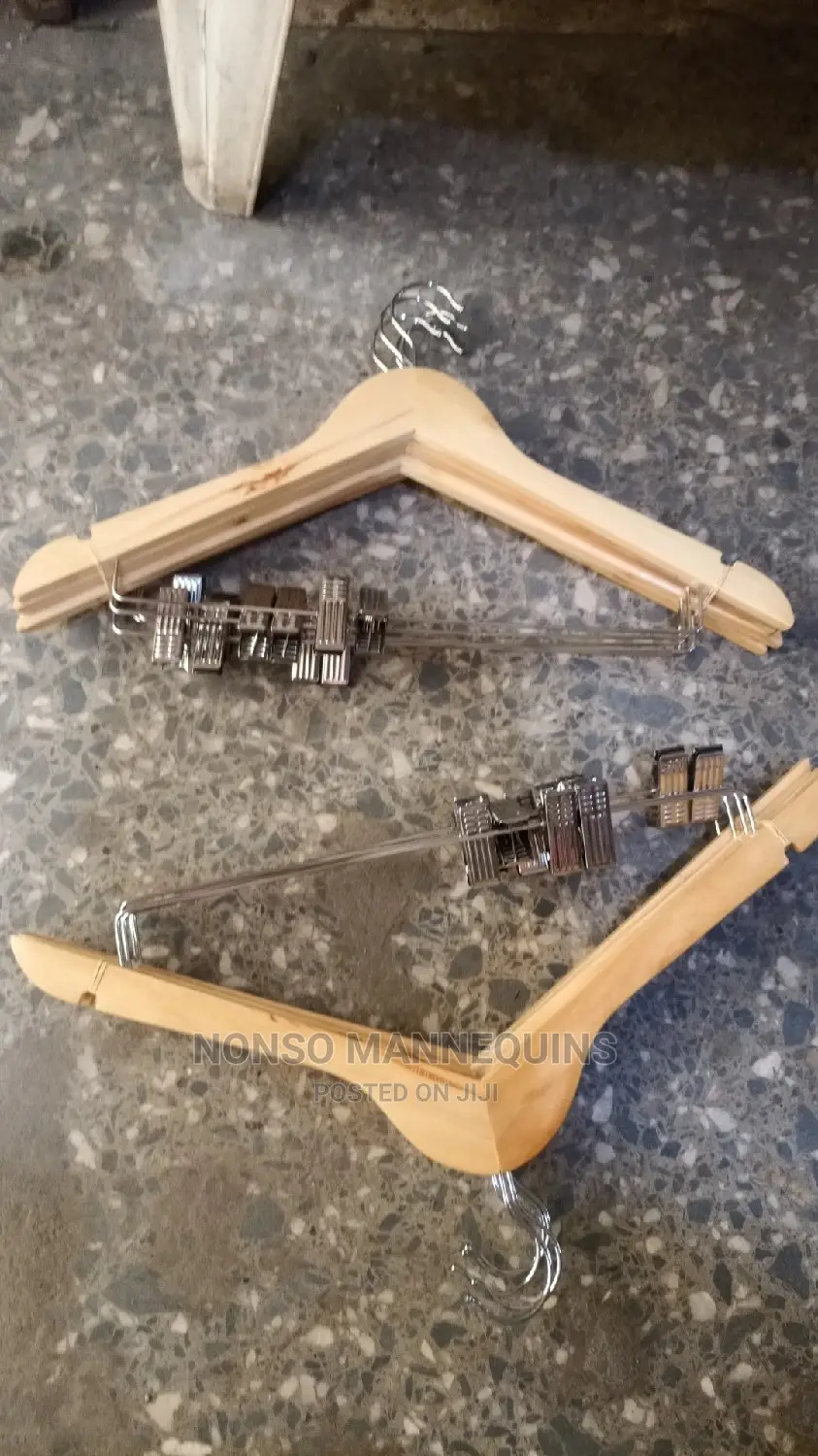 A Pack of Wooden Clip Imported Hangers