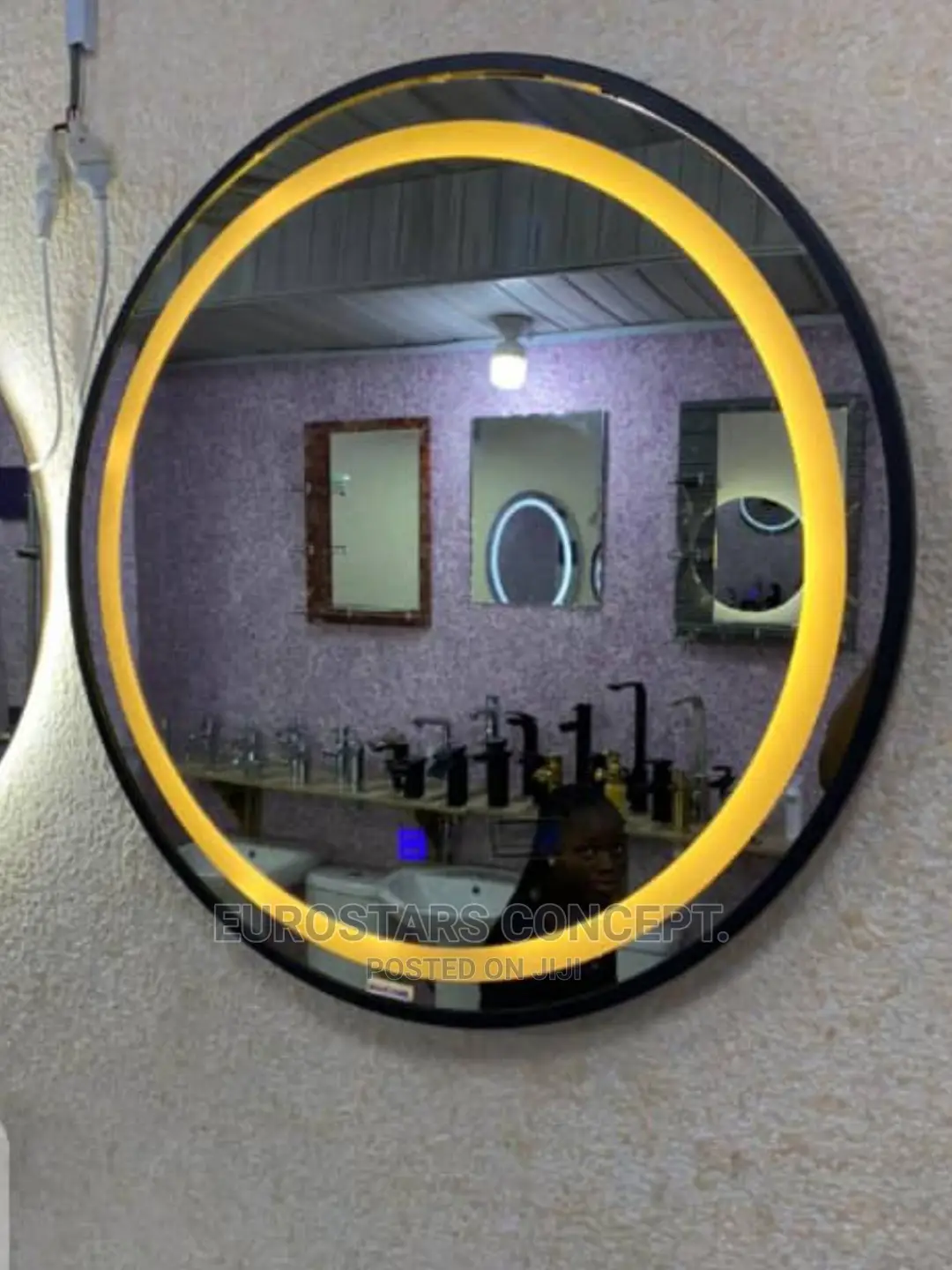 Round Black Mirror With Gold Light
