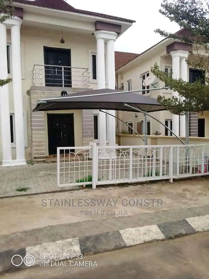 Carport Brown Net Galvanized Pipes