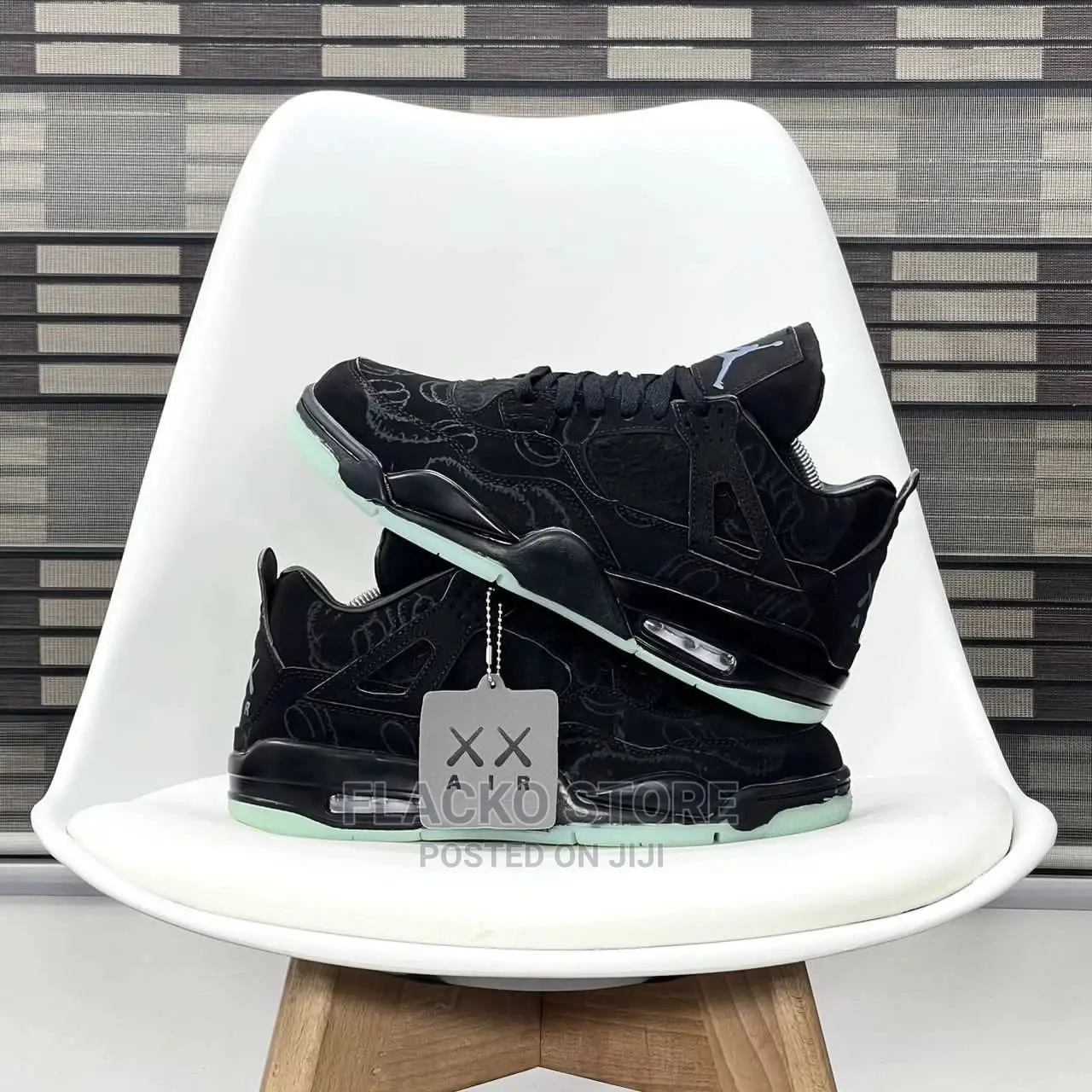 Original Air Jordan 4 Retro ‘Kaws’ Black Sneakers Available