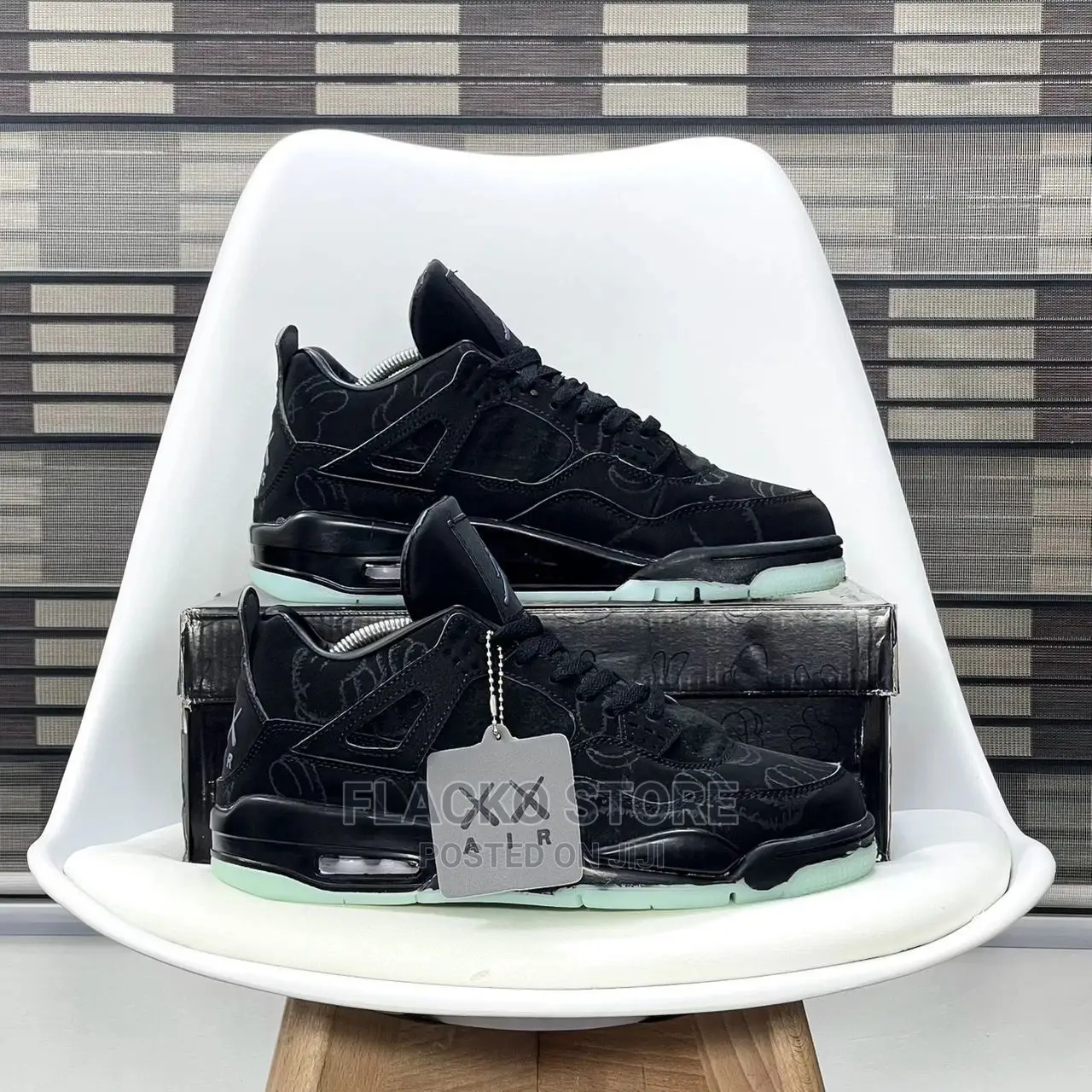 Original Air Jordan 4 Retro ‘Kaws’ Black Sneakers Available