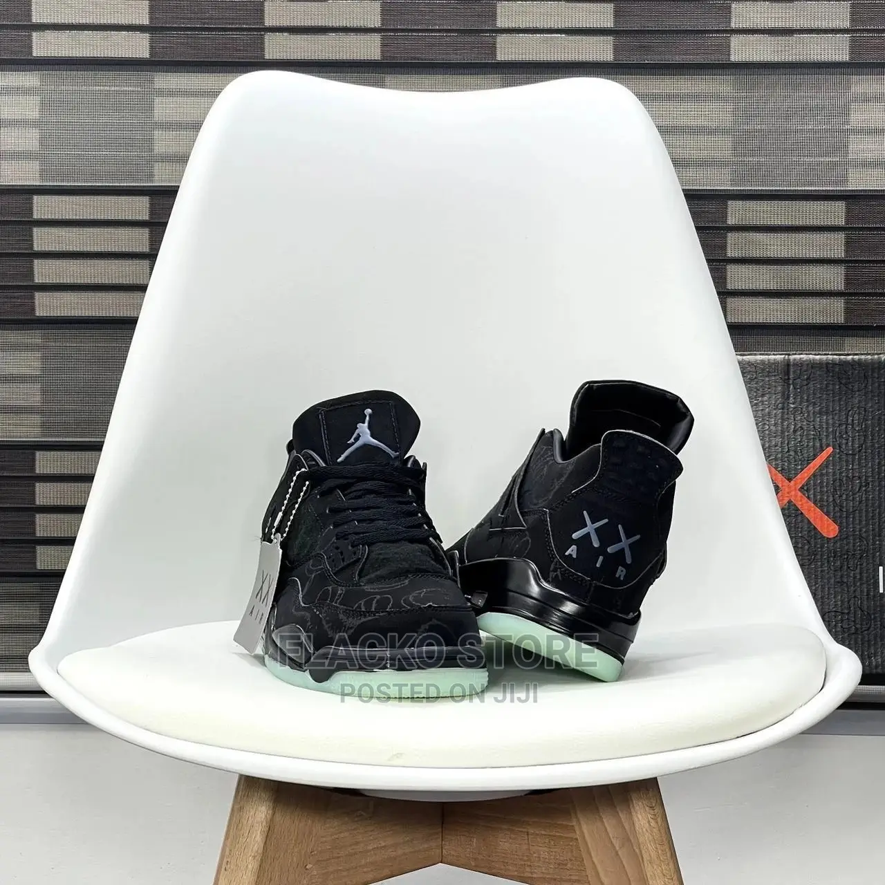 Original Air Jordan 4 Retro ‘Kaws’ Black Sneakers Available