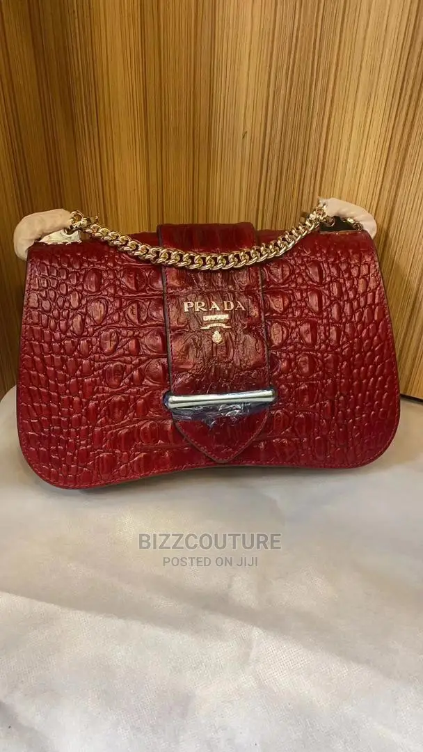 PRADA Top Notch Shoulder Bags Available in Store