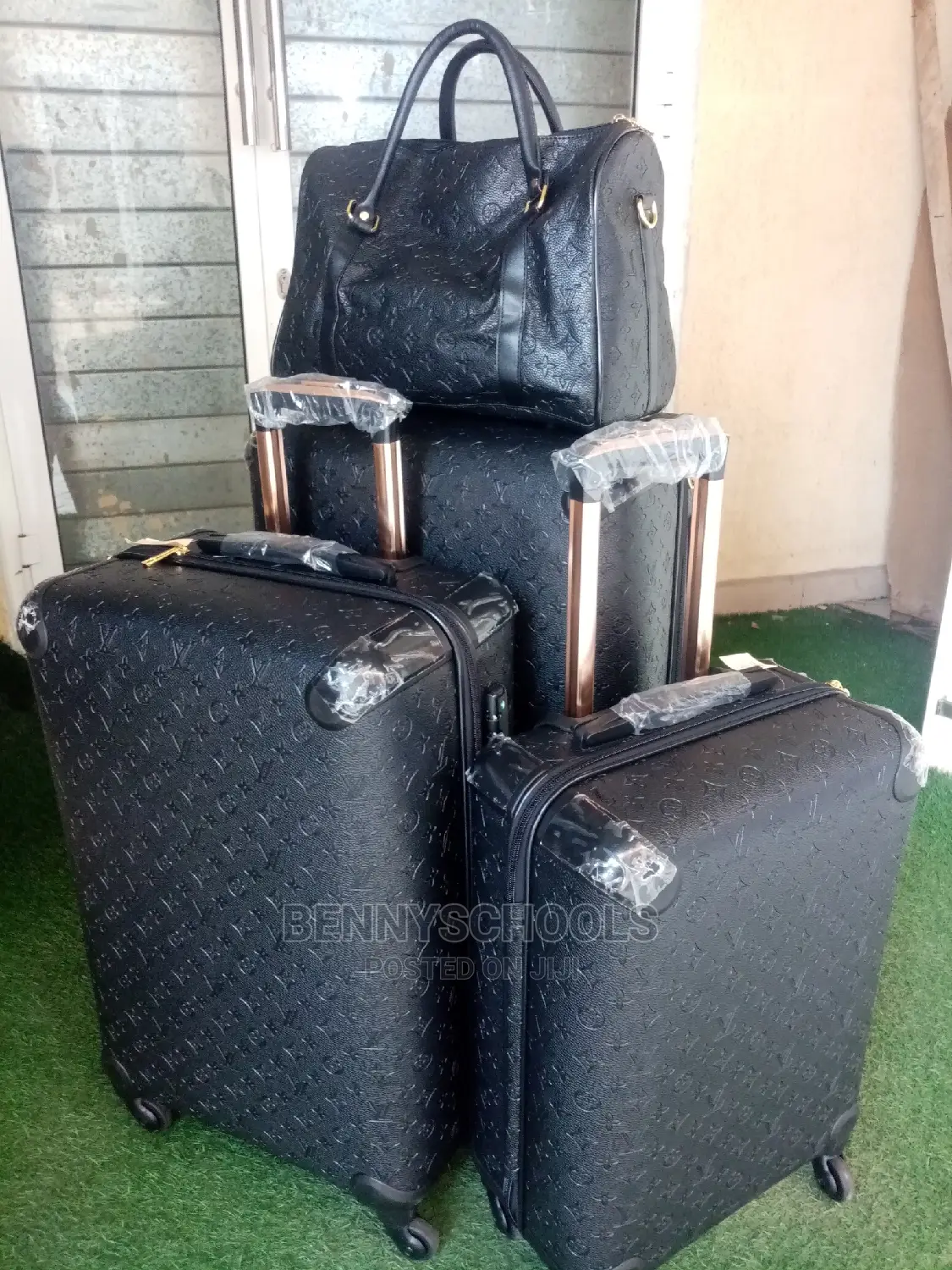 Set of 4 Imported Black Luis Vuitton Traveling Luggage Boxes