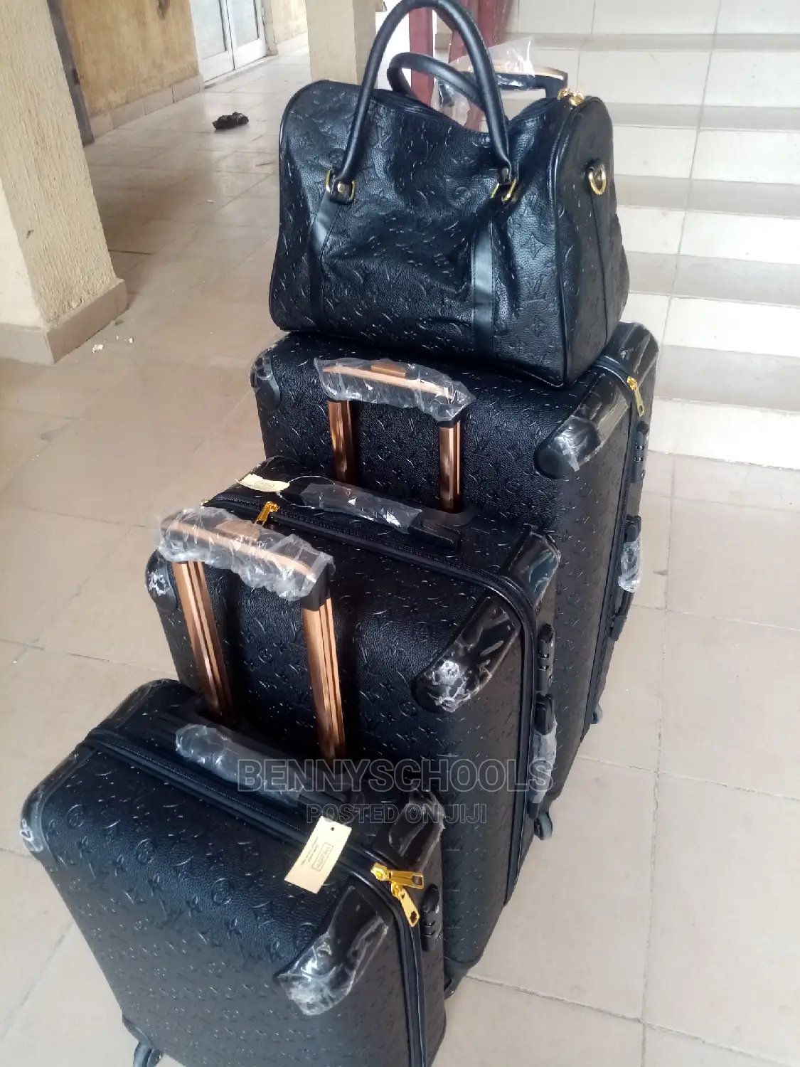 Set of 4 Imported Black Luis Vuitton Traveling Luggage Boxes