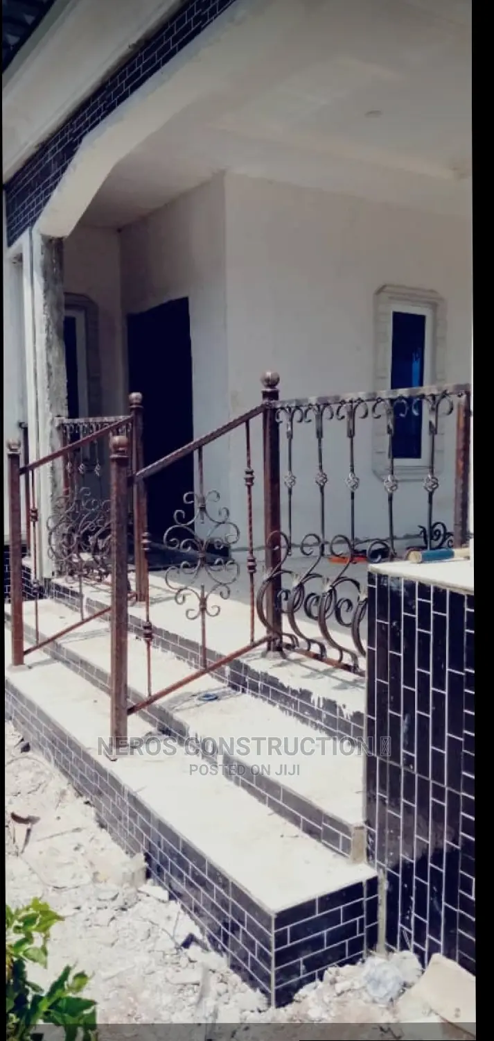 Semi Pregnant Woman Wrought Iron Design