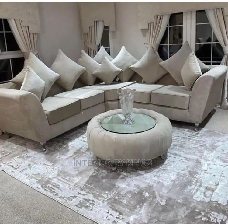 U-Shaped Fabric Sofa With a Center Glass Ottoman
