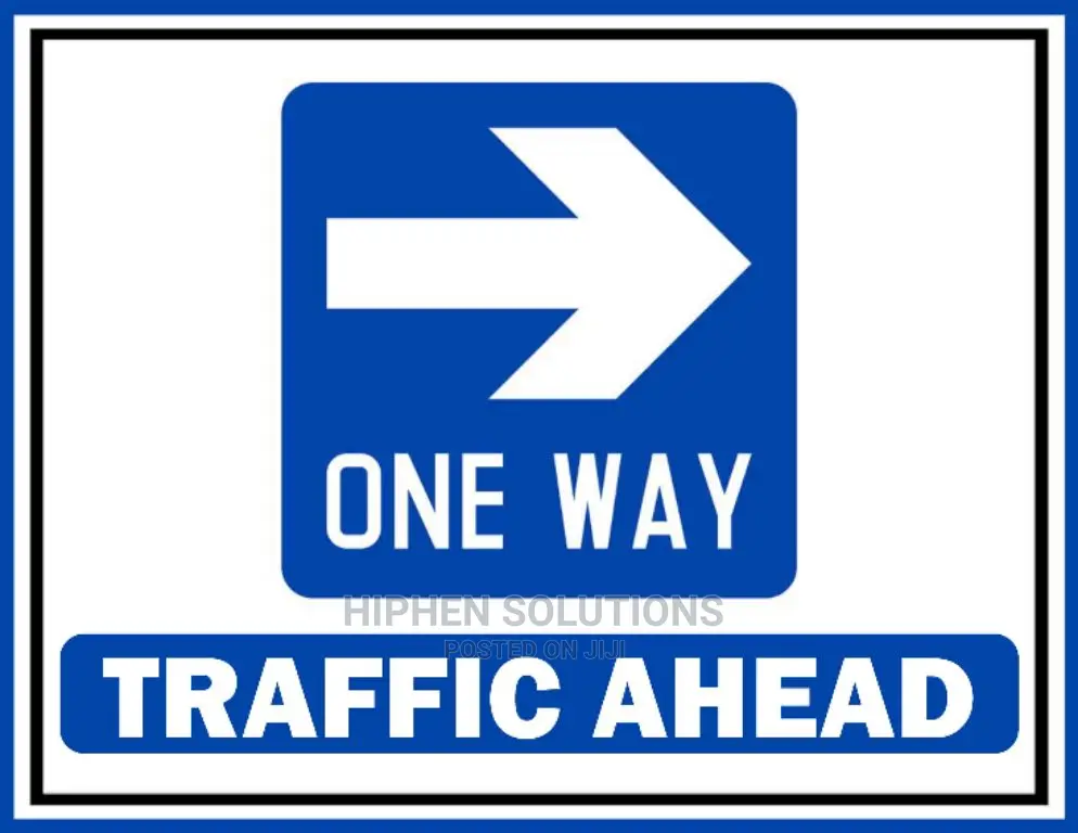 One Way Arrow Road Sign Warns Drivers