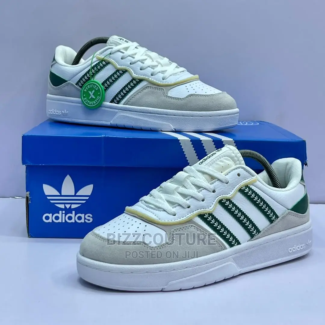 Original ADIDAS Tyshawn Low Sneakers Available in Store