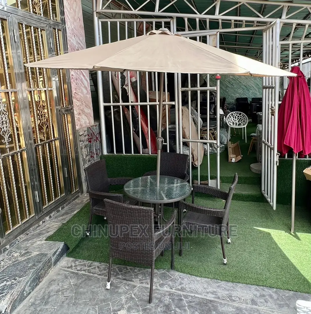 4 Seaters Rattan Chairs and Glass Table With Umbrella