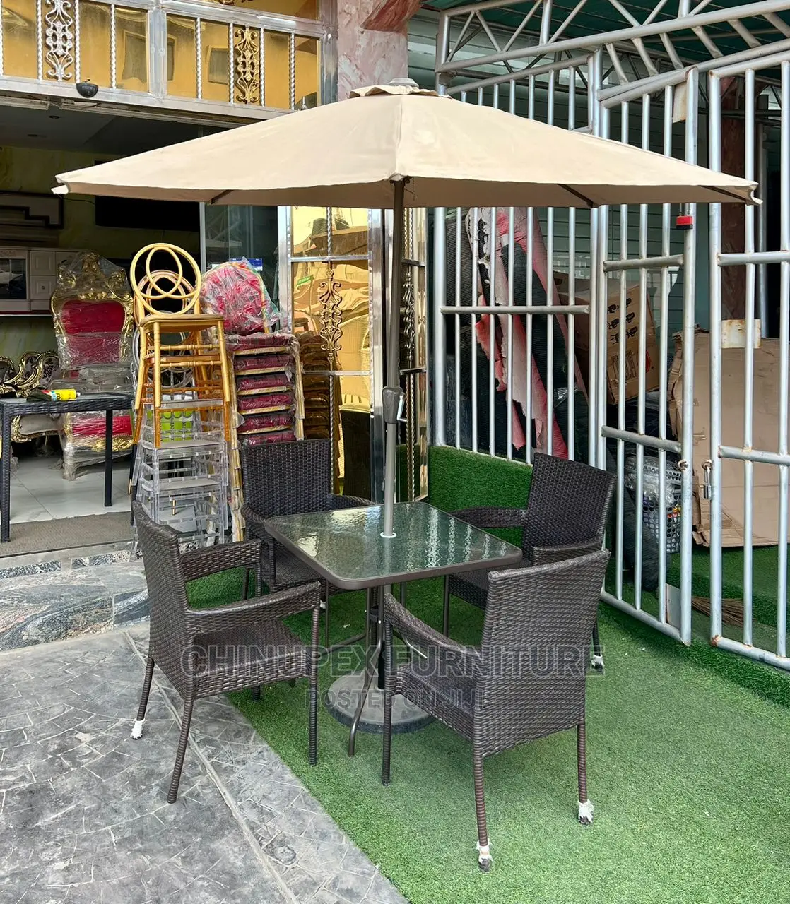 4 Seaters Rattan Chairs and Glass Table With Umbrella