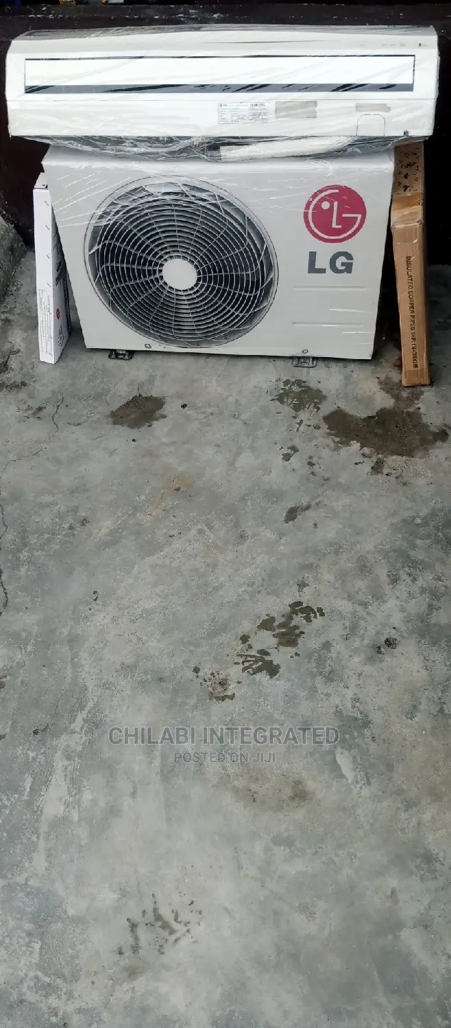Few Months Old/Foreign Used 1.5HP LG Air Conditioner + Gas