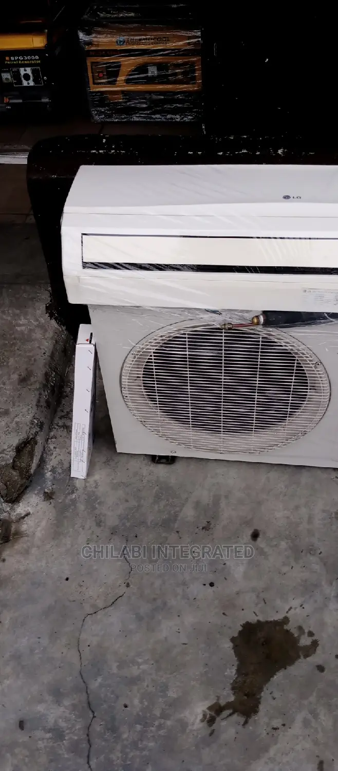 Few Months Old, Foreign-Used 1.5HP LG Air Conditioner + GAS