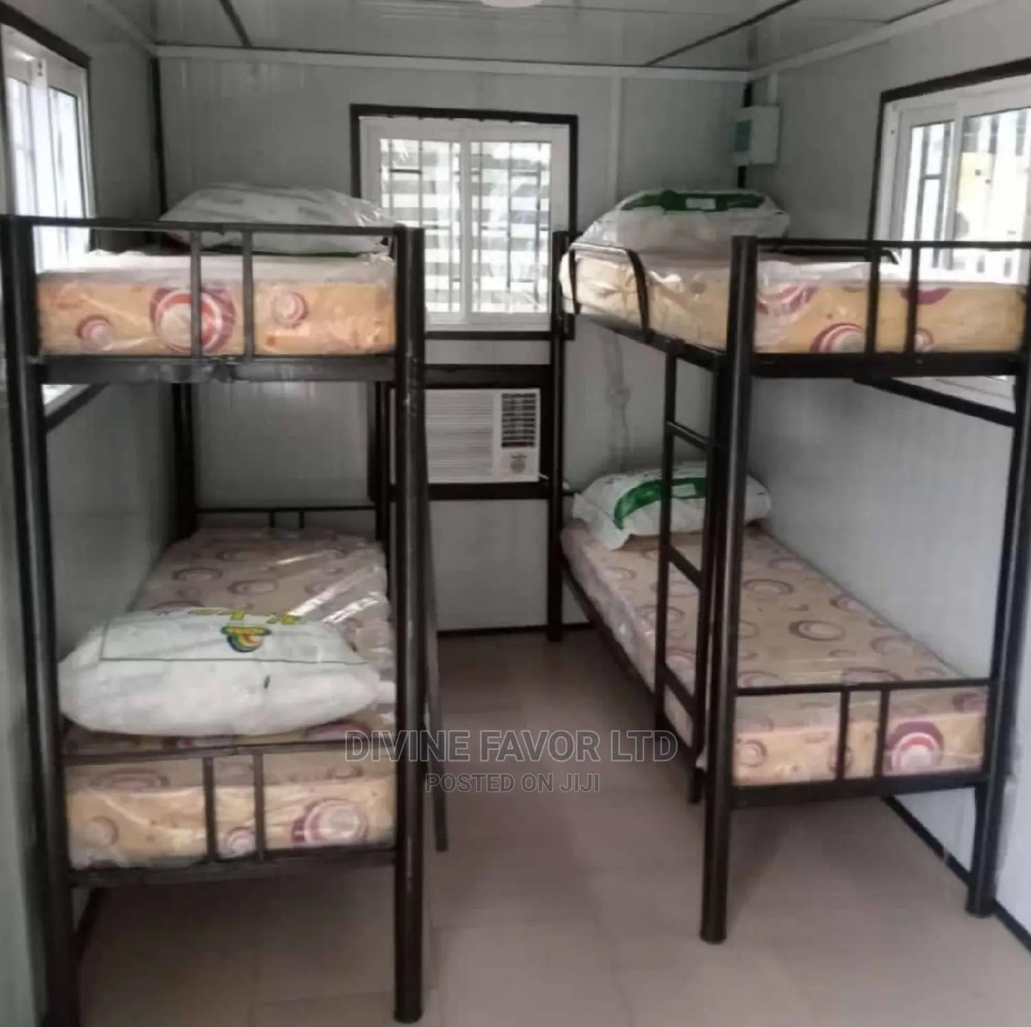 A Double Bunk Bed With 2 Mattresses