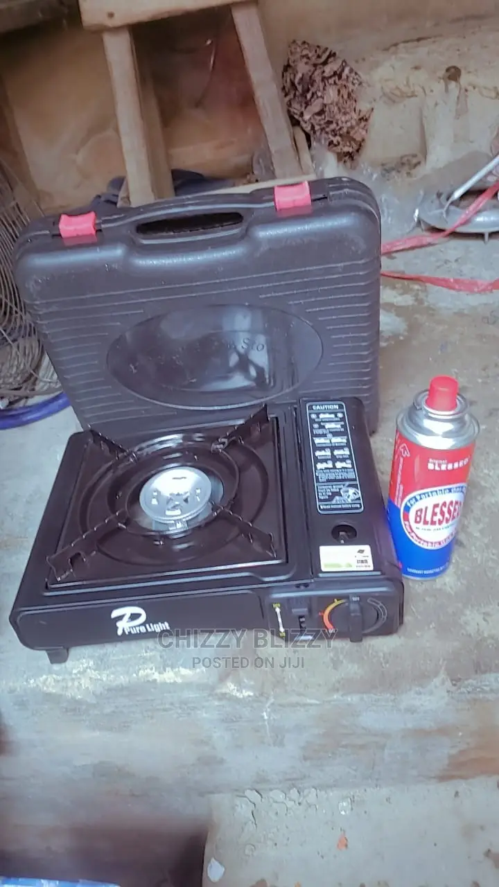 Portable Camping Gas Cooker With Extra Refilling Gas.