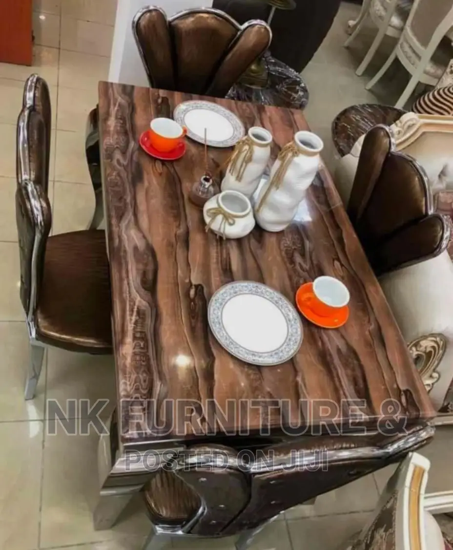 Marble Top Dining Table by Four Chairs