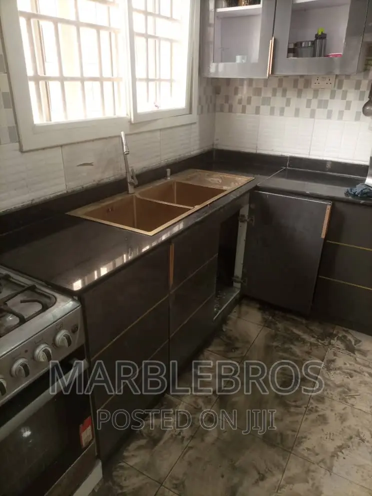 MB89,. Countertop Finishing With Black Marble And HDF Wood
