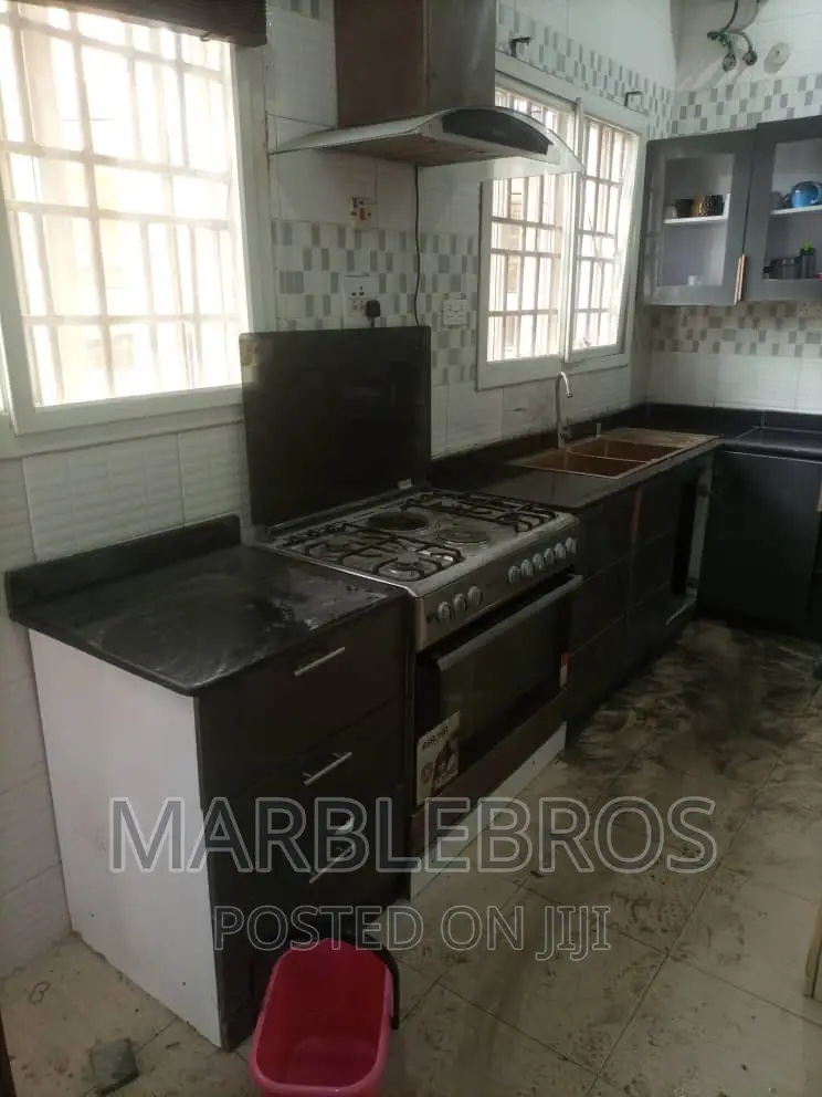 MB89,. Countertop Finishing With Black Marble And HDF Wood