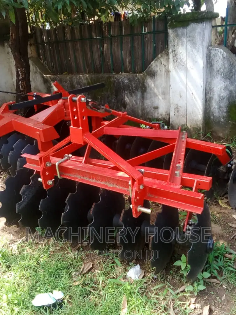Massey Ferguson Tractor 375 With the Implements Disc
