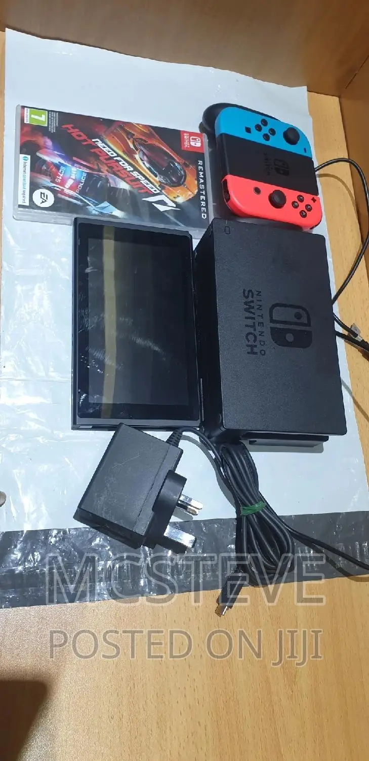 Nintendo Switch With Complete Accessories and One Free Game