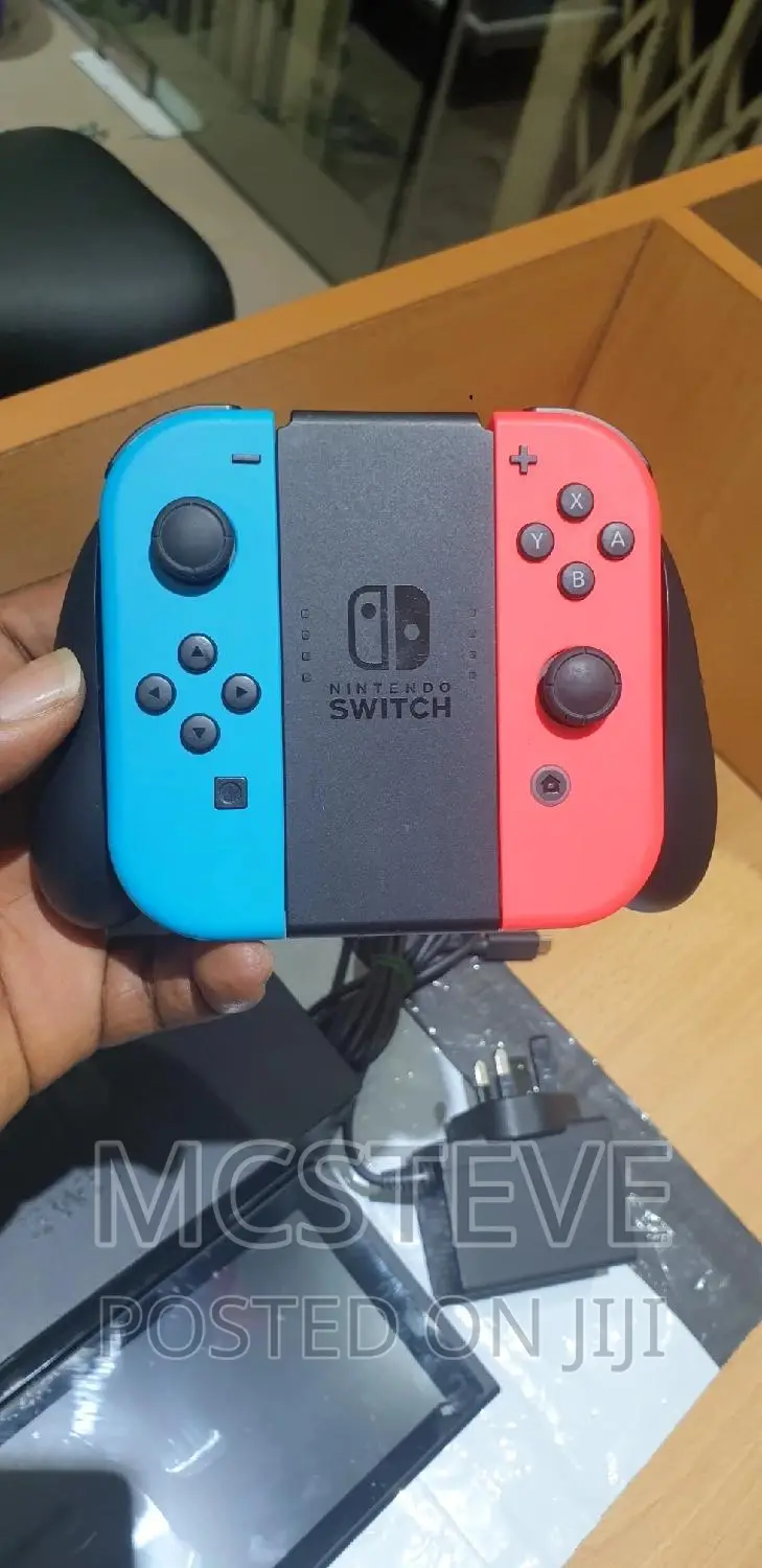Nintendo Switch With Complete Accessories and One Free Game