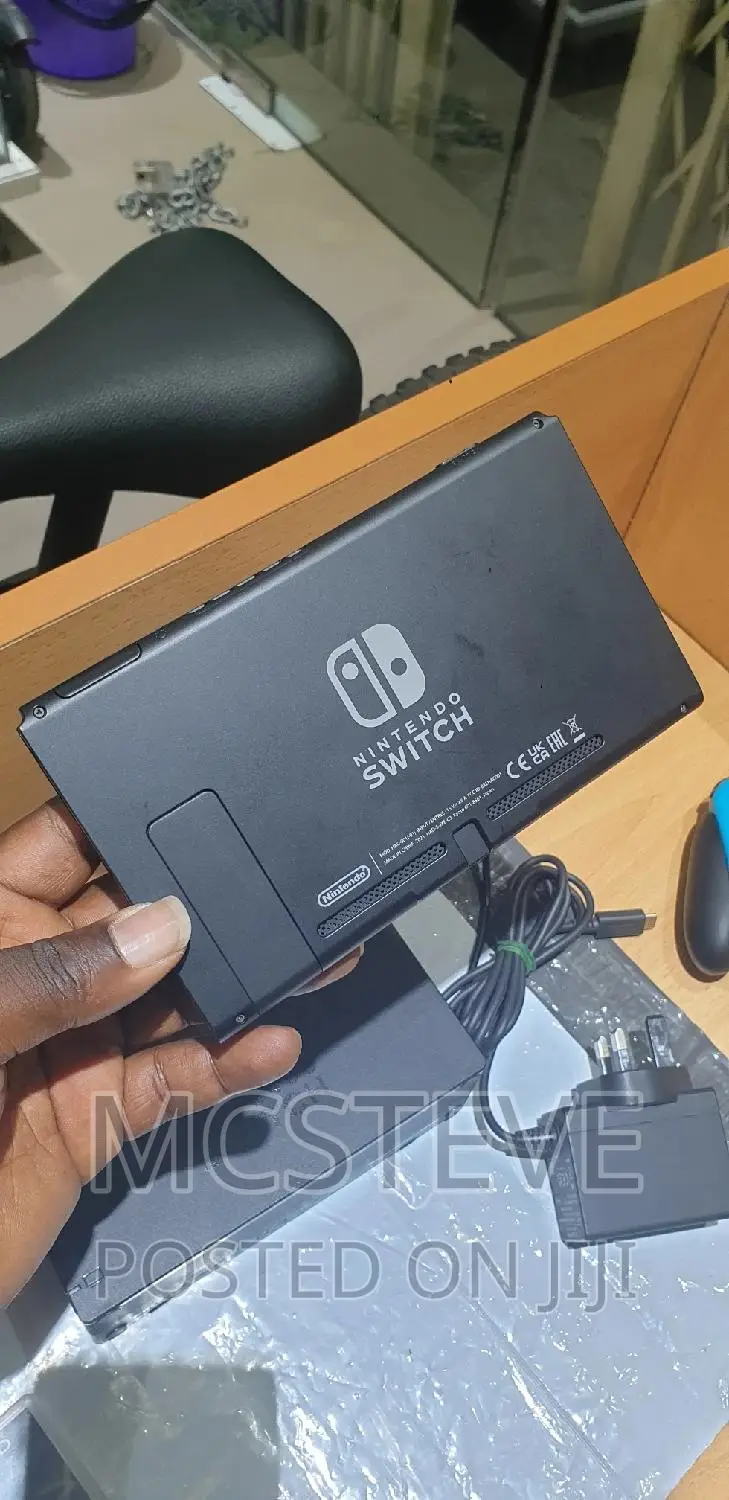 Nintendo Switch With Complete Accessories and One Free Game