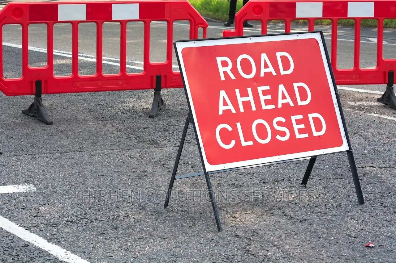 Caution Road Closed Ahead Sign