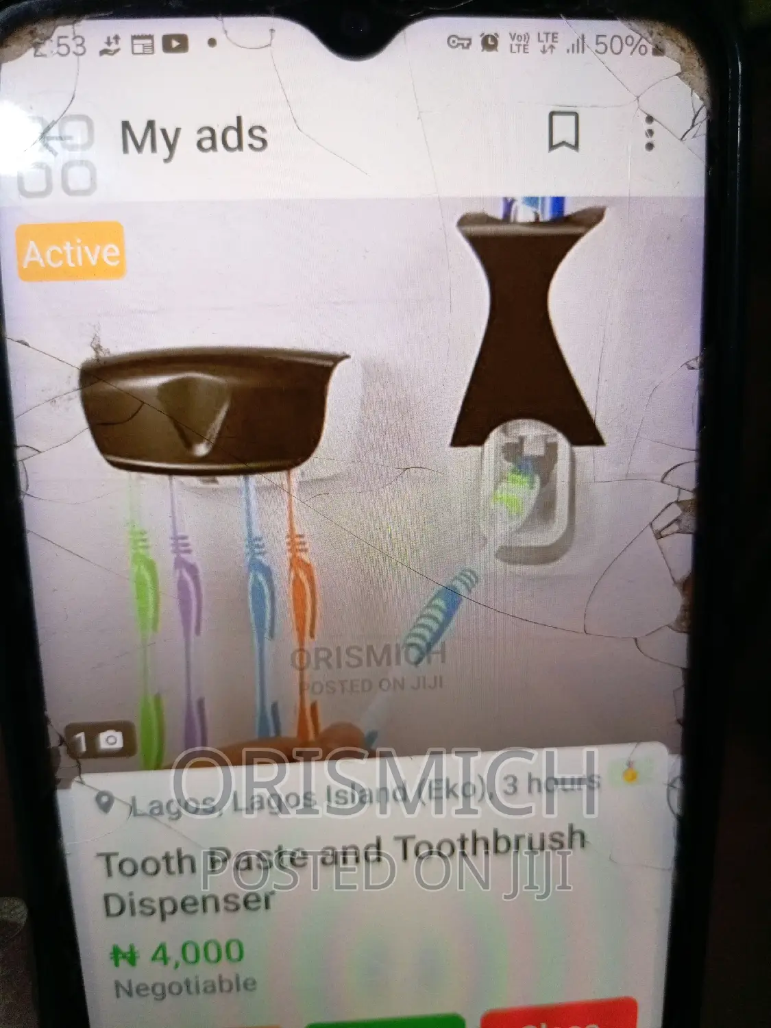 Tooth Paste Dispenser and Toothbrush Holder
