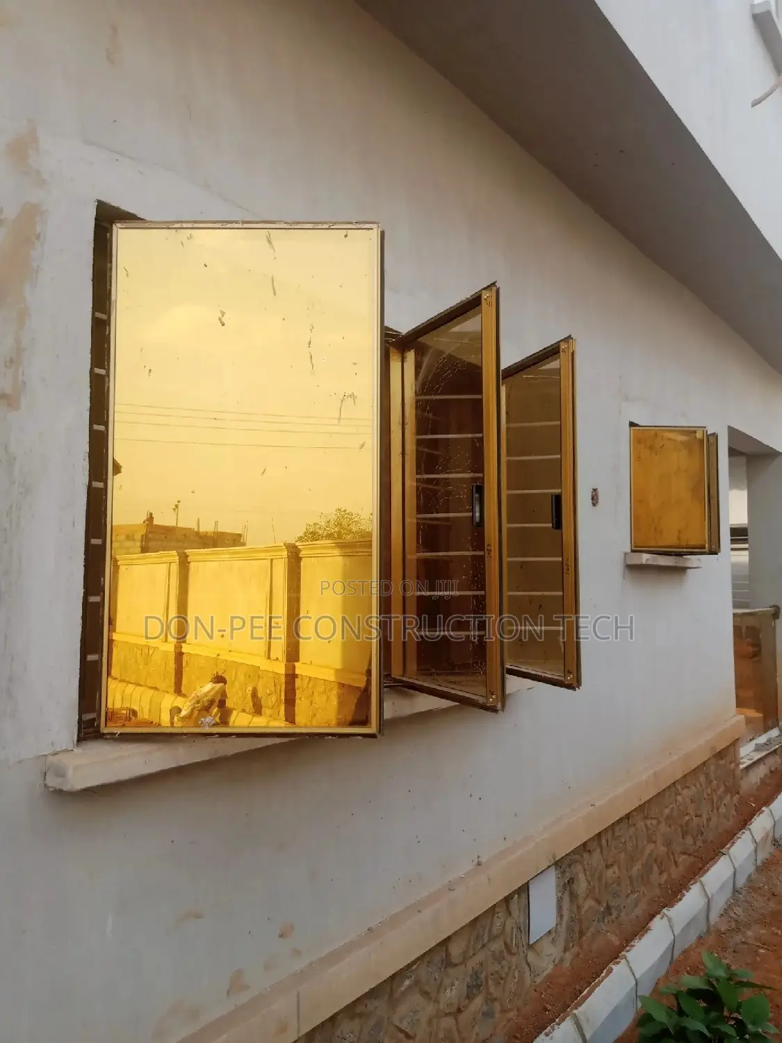 Golden Frameless Window