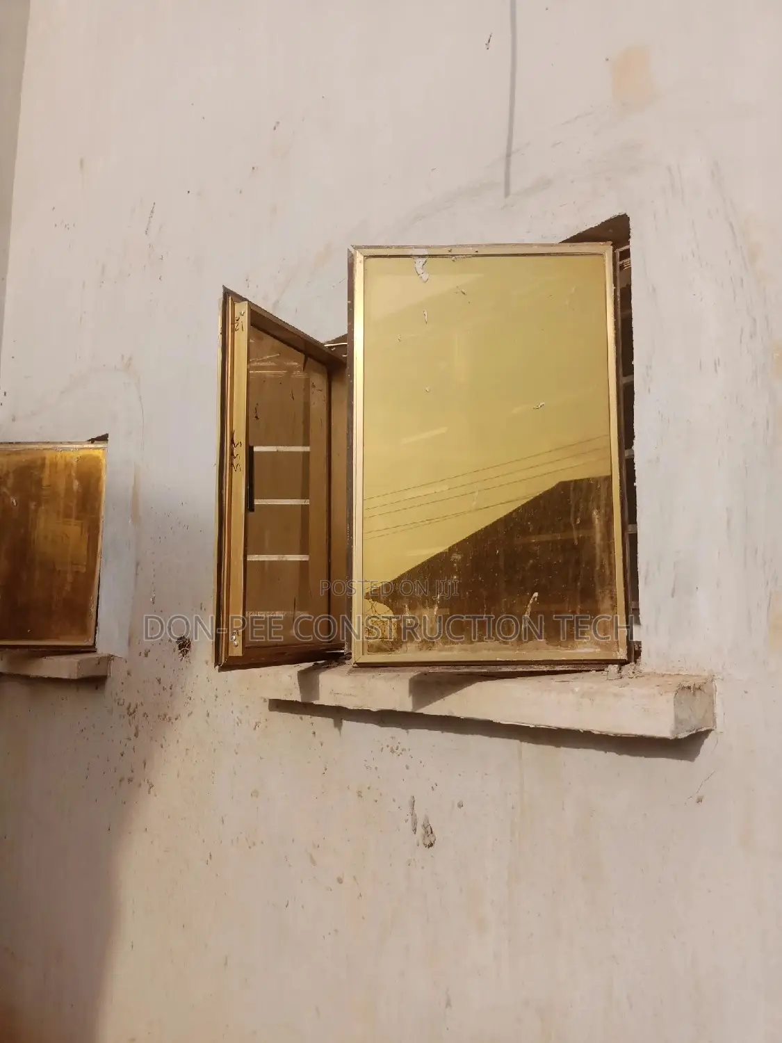 Gold Frameless Window