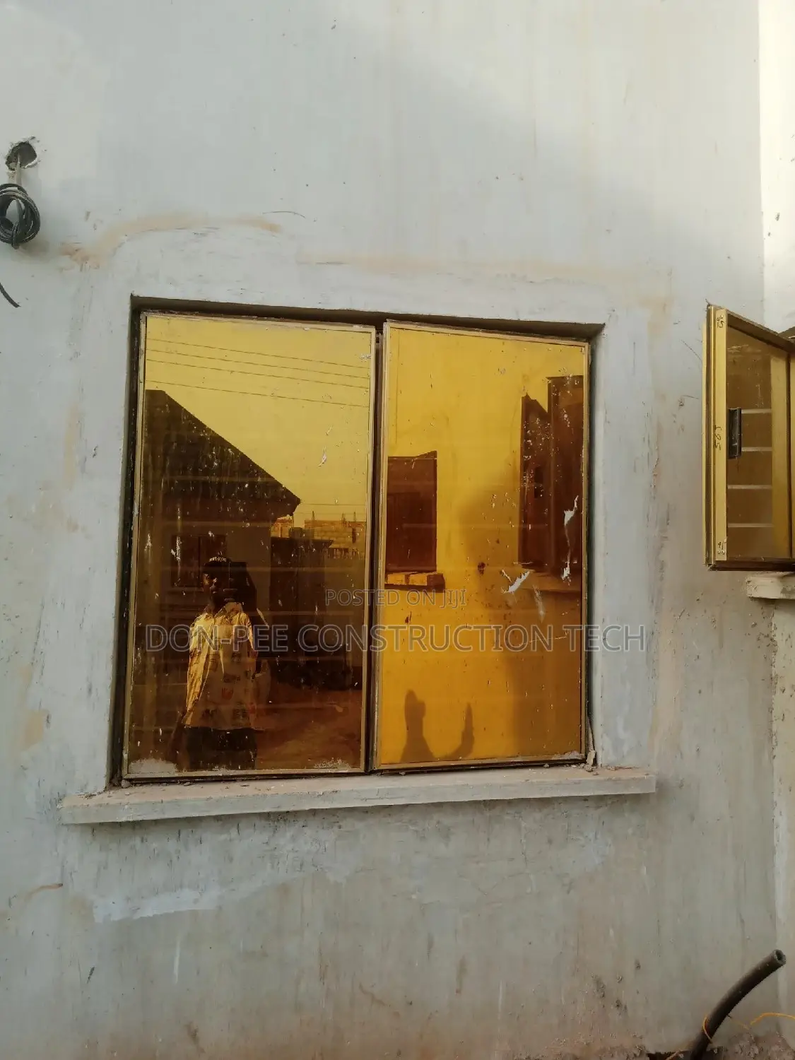 Gold Frameless Window