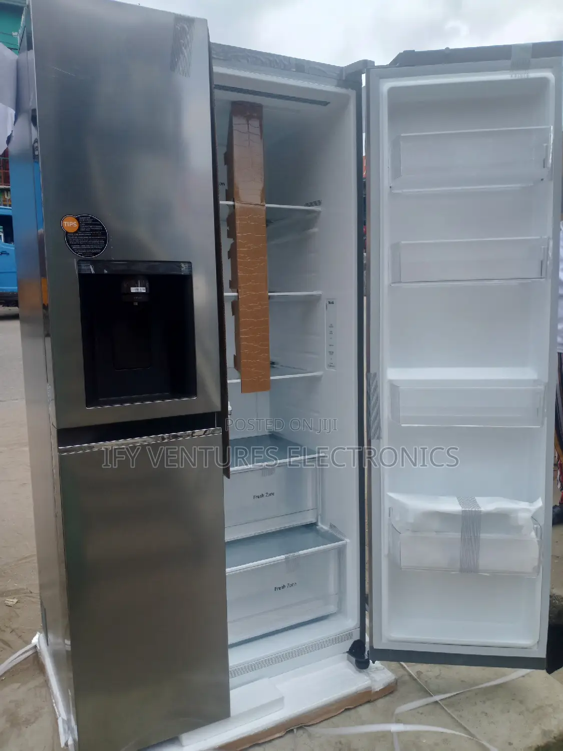 LG Side by Side Refrigerator With Ice Maker and Dispenser.