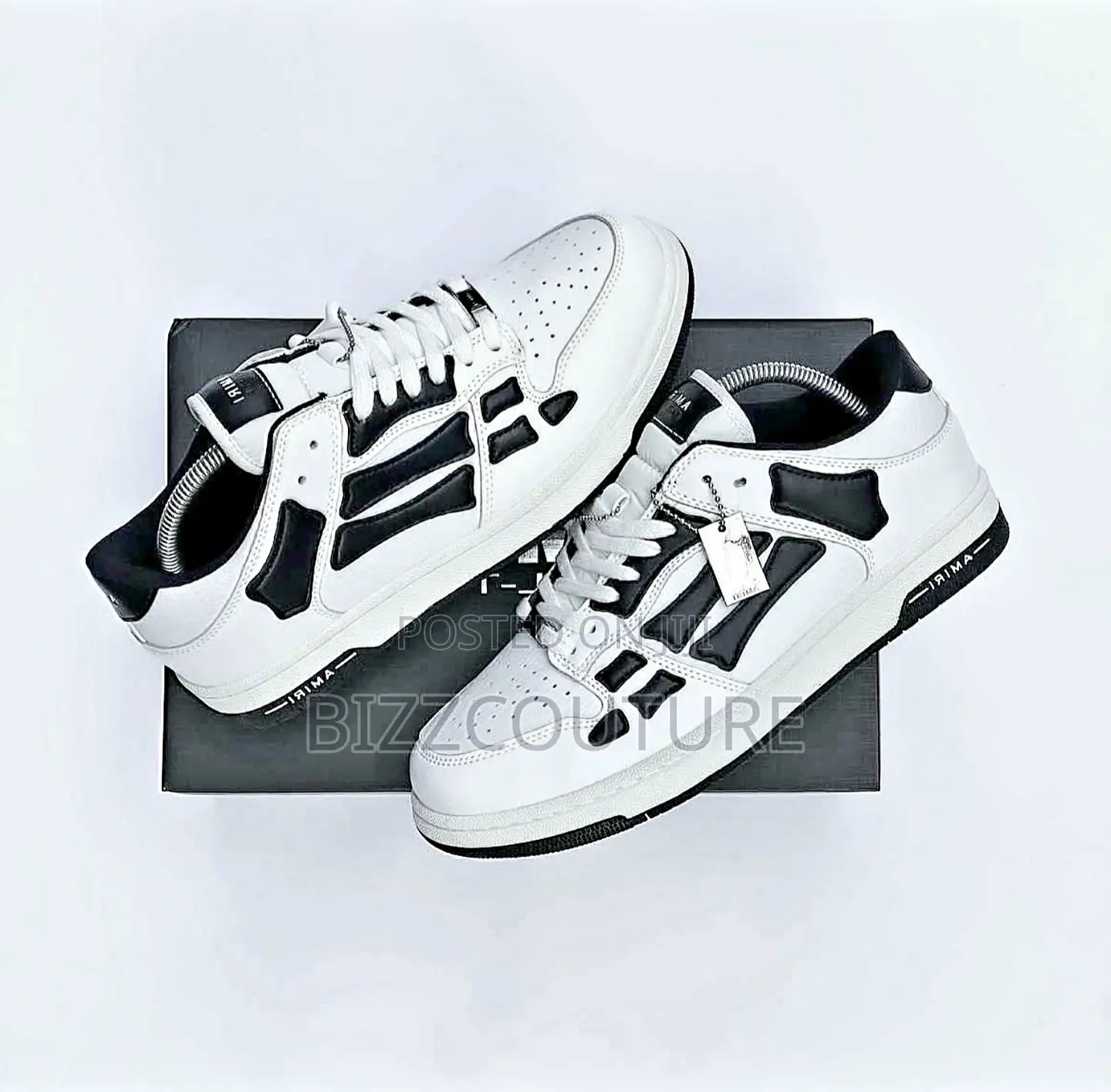 Original Amiri Skel Top Low Sneakers Available in Store