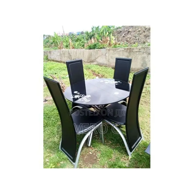 Quality Round Glass Dining Table and 4 Chairs.