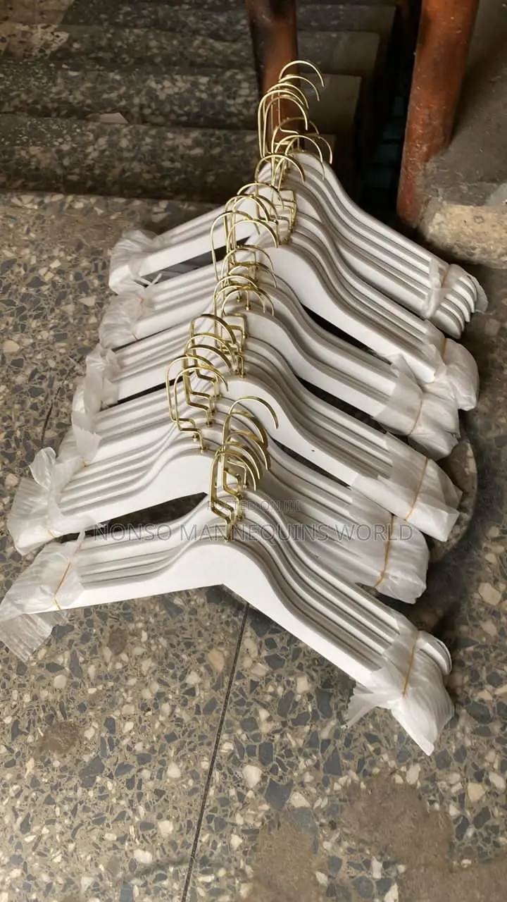 White Hangers With Gold Head.