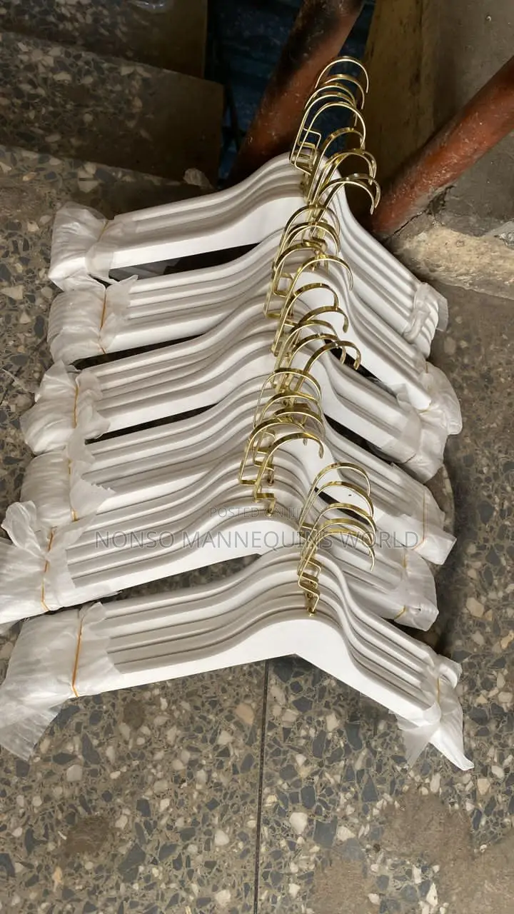 White Hangers With Gold Head.