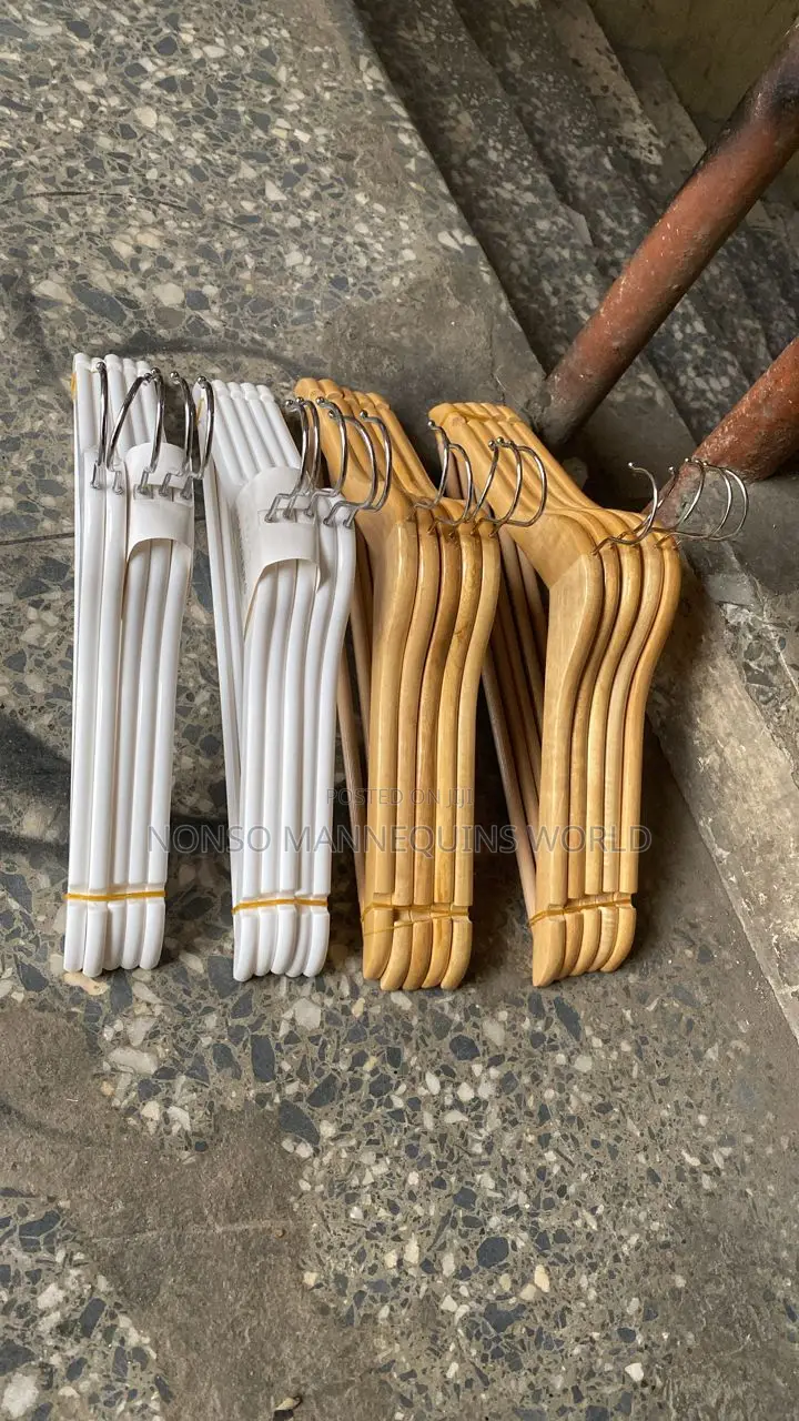 Sets of Ceramic White Hangers and Wooden Hangers