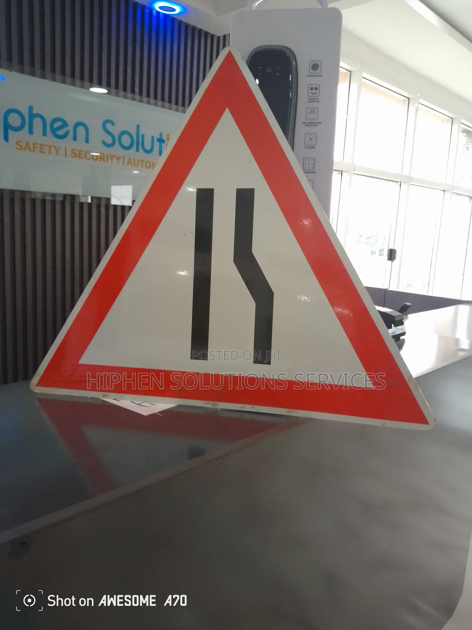 Road Narrows Traffic Sign