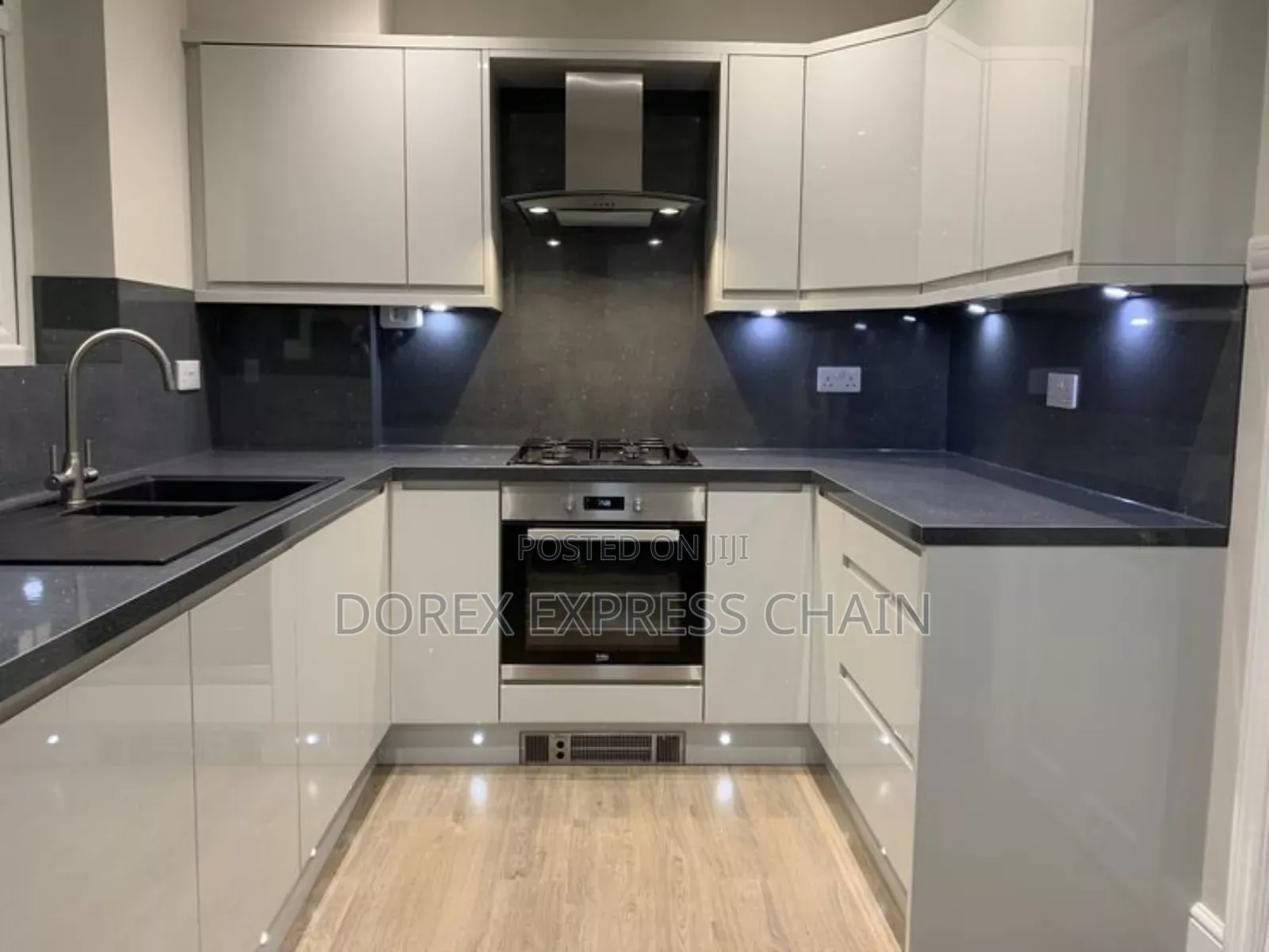High- Gloss U-Shaped Kitchen Interior.
