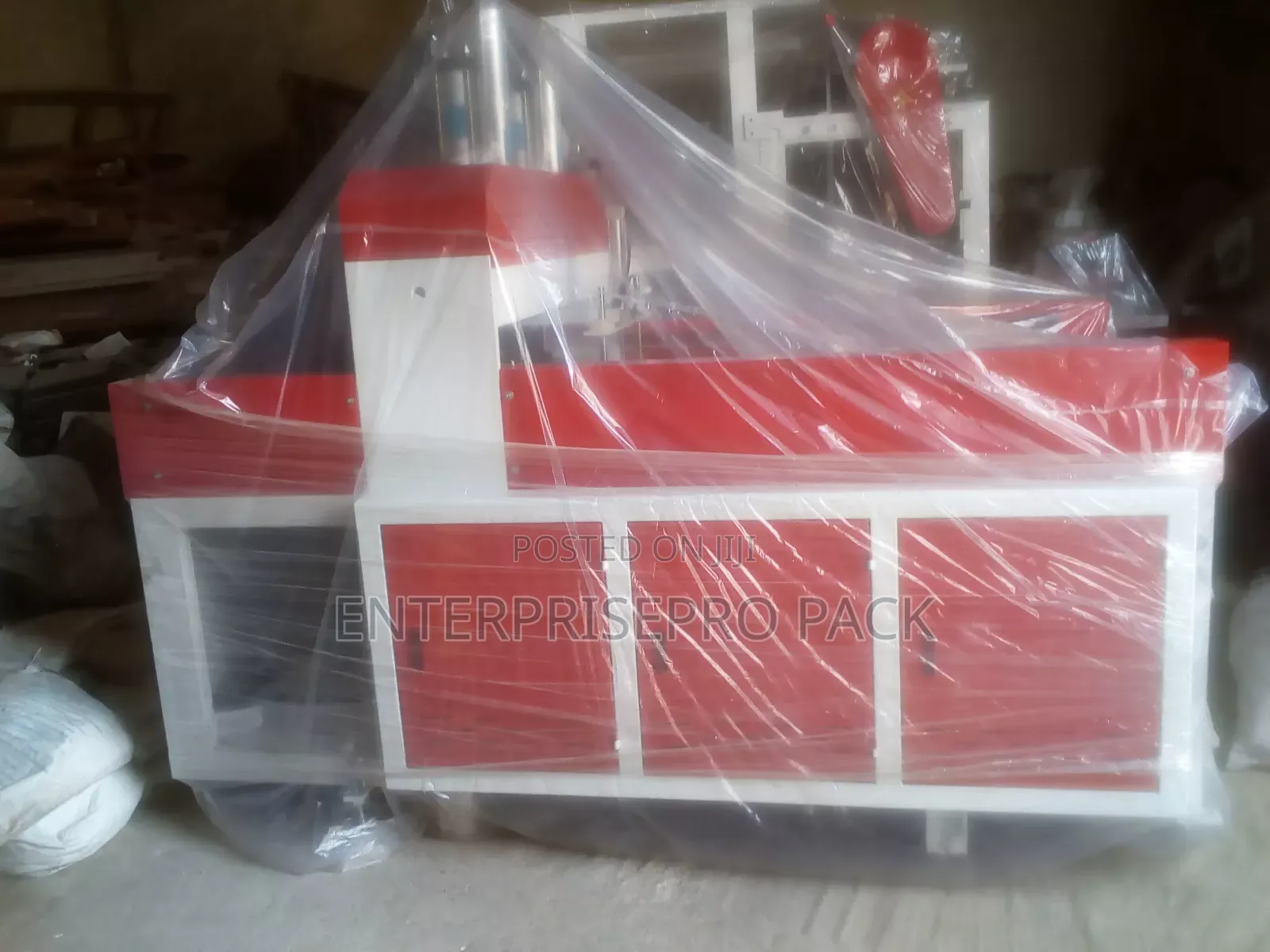 Automatic Nylon Cutting, Sealing and Punching Machine
