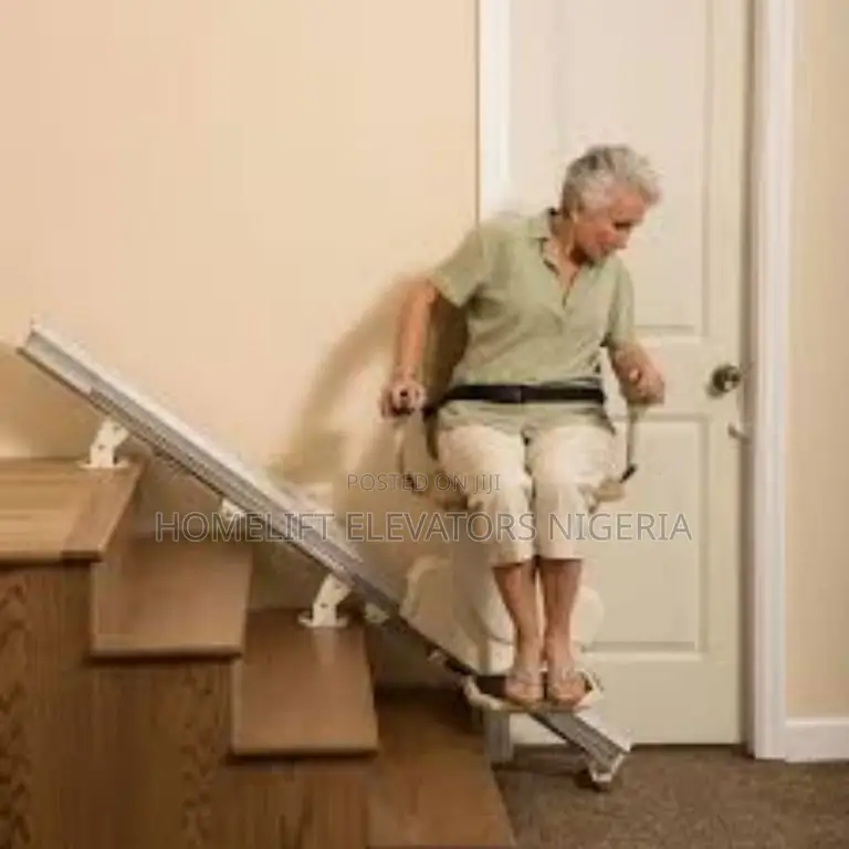 Senior Woman Using Automatic Stairlift