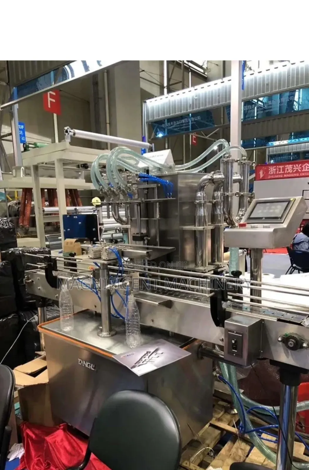Linear Automatic Four Head Nozzle Liquid Filling Machine