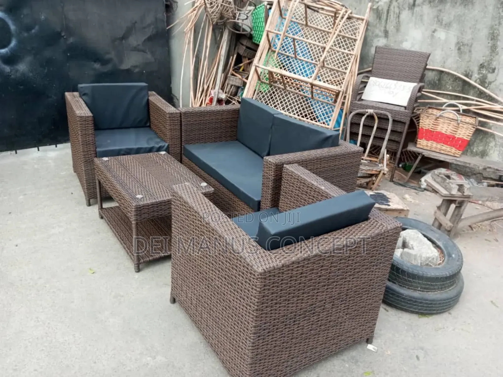 Brown Cane Chair With Black Cushion for Outdoor