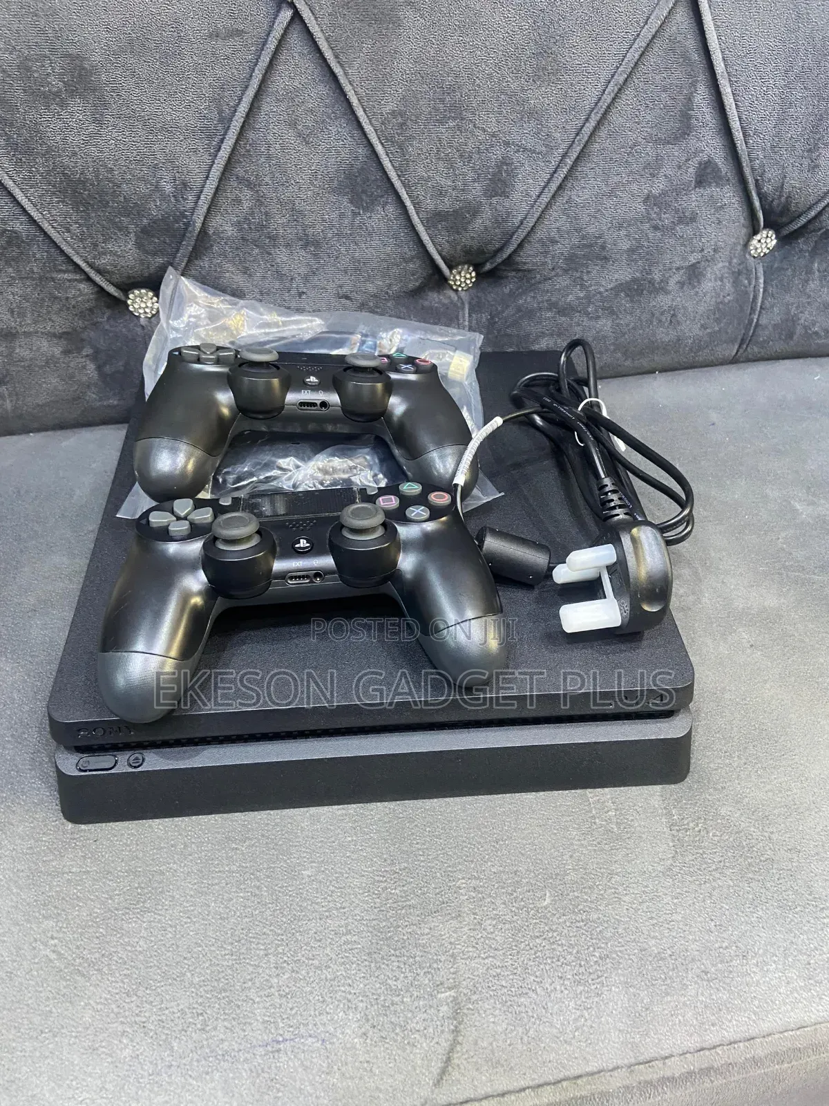 Neatly Used Ps4 Slim 500GB With 12games and 2pads