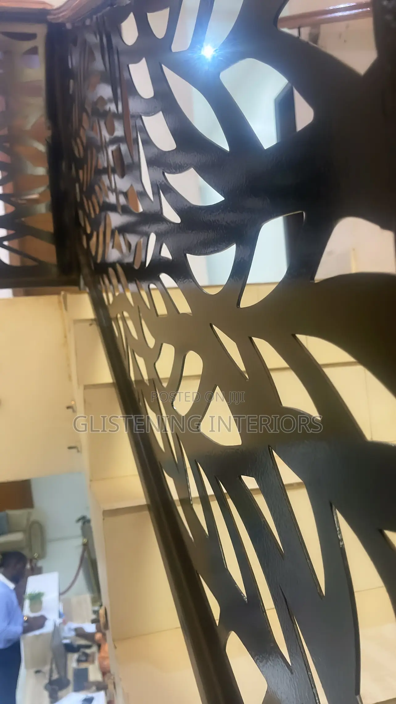 Wrought Iron Handrail With a Mahogany Wood