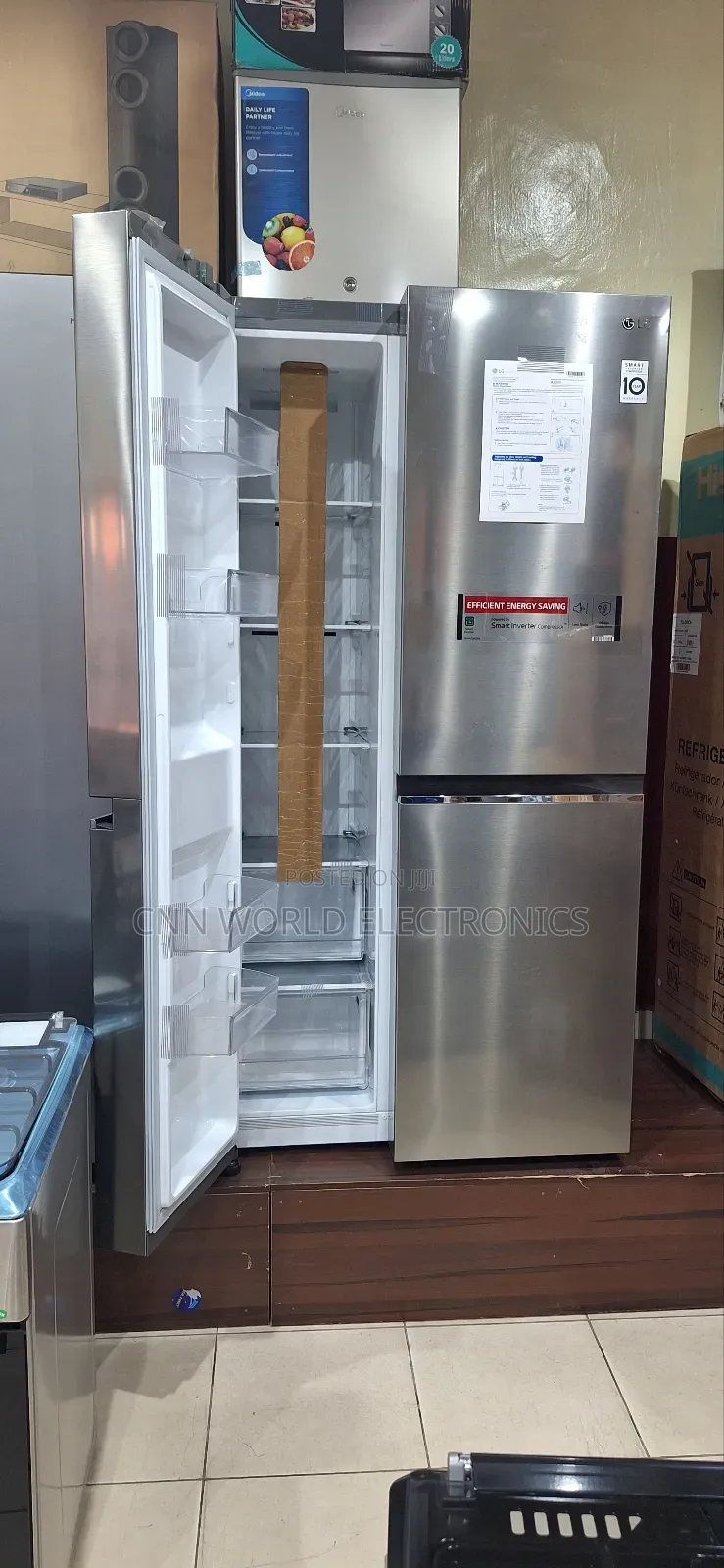 New LG Smart Inverter 688L Side by Side Fridge (150W) 2years