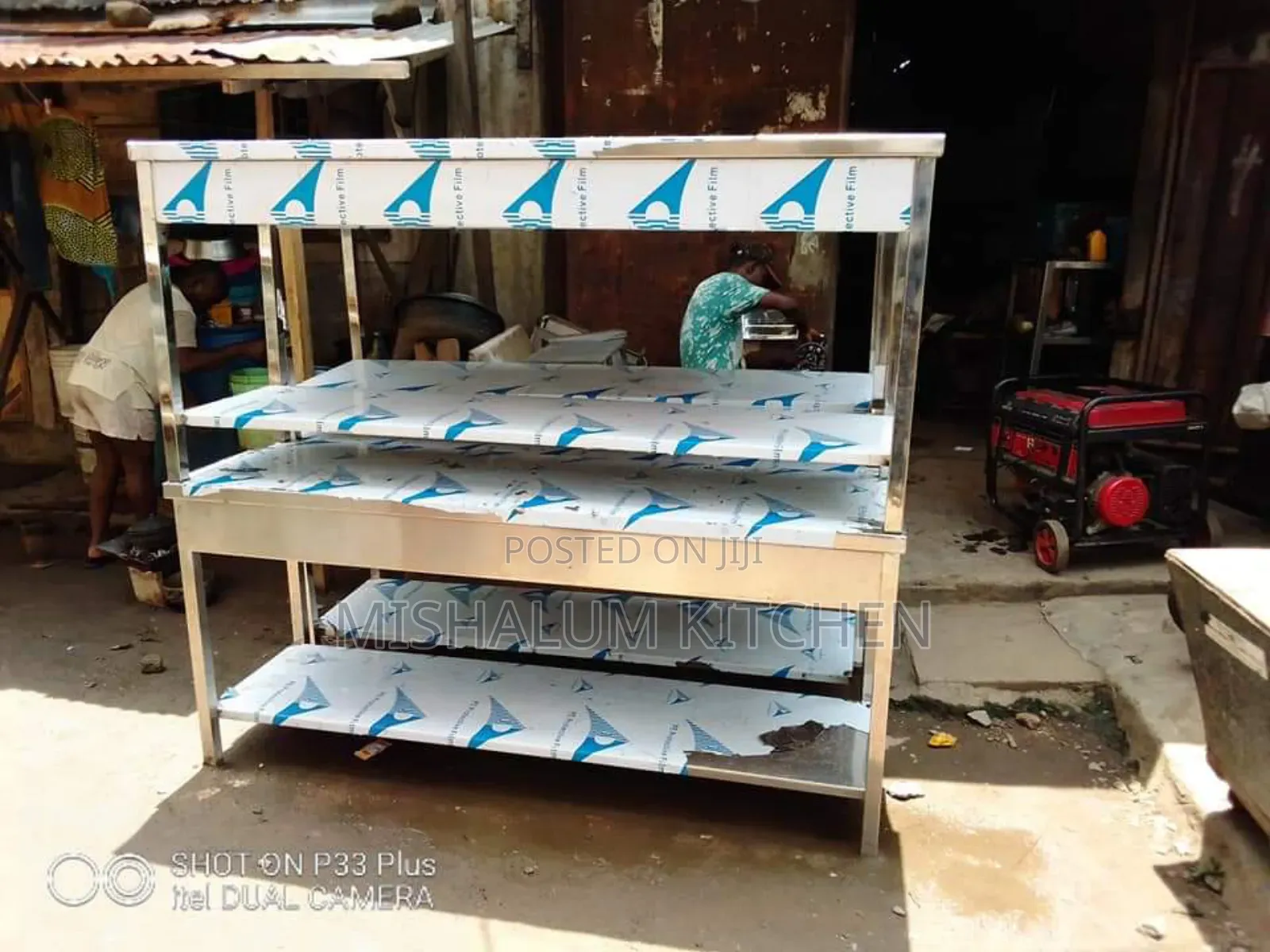 5 Ft. Stainless Steel Padded Work Table With Under Shelves