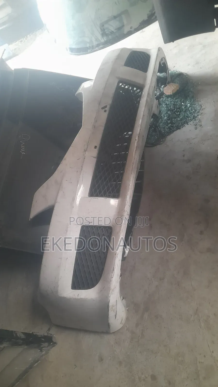 Complete Front Bumper for Mazda Premany 2003 Model